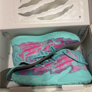 Vibrant Teal and Pink basketball sneakers